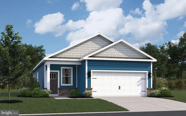 a view of house with yard