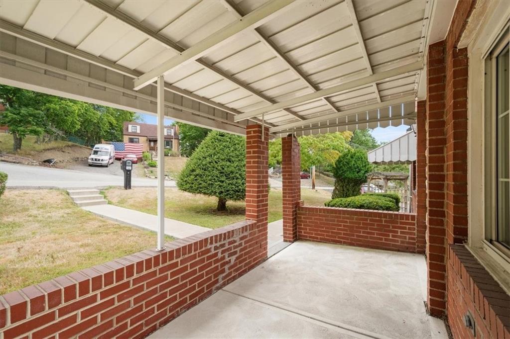 701 Wible Run Road Pittsburgh, PA 15209 - Photo 2 of 33 a balcony with lots of green space
