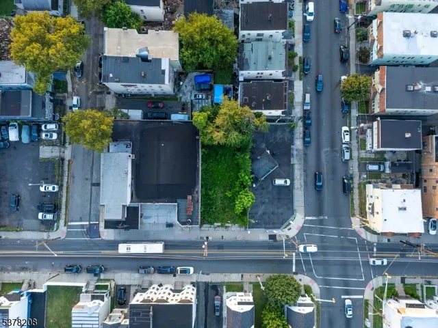 a picture of a street with lots of signs