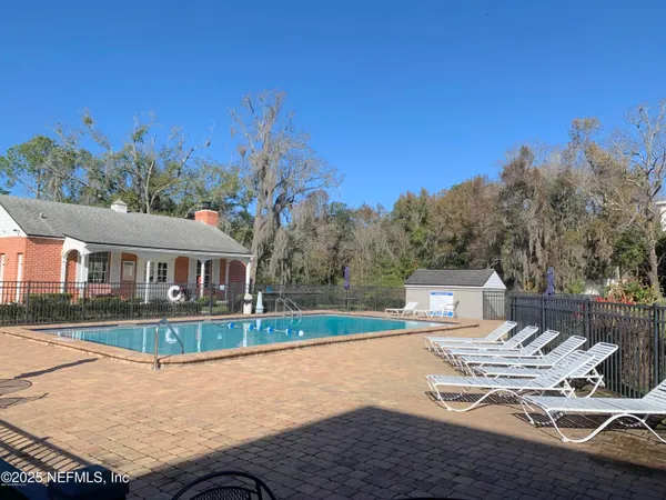 a view of a house with swimming pool