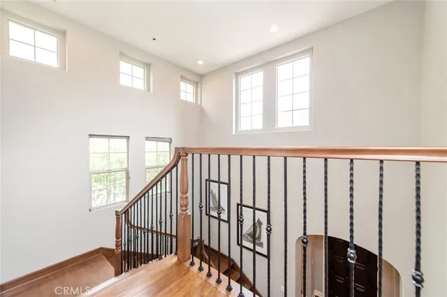 a view of a hallway with windows