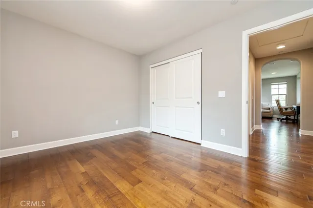a view of a livingroom with wooden floor