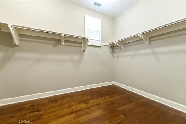 a view of a room with shelf on the wall