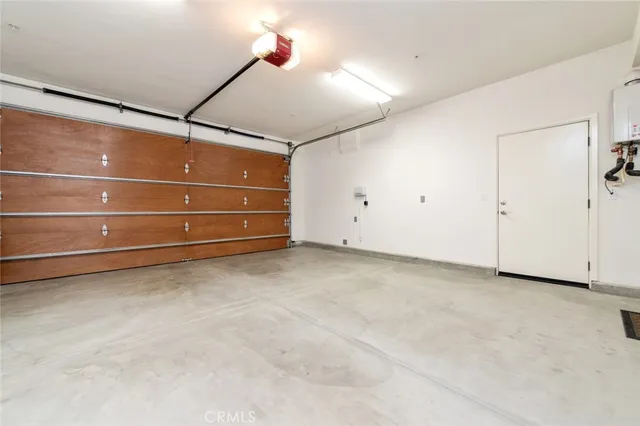a view of room with a ceiling fan