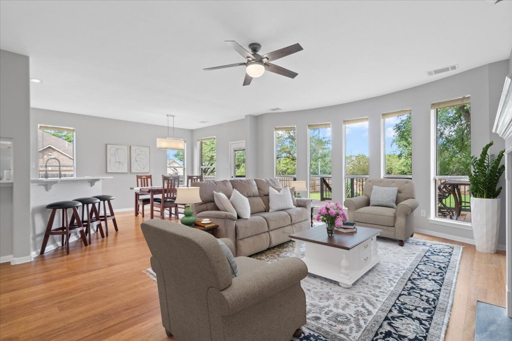 10801 Beachmont Lane Austin, TX 78739 - Photo 14 of 40 Virtually staged - tons of room for plenty of seating in your living room