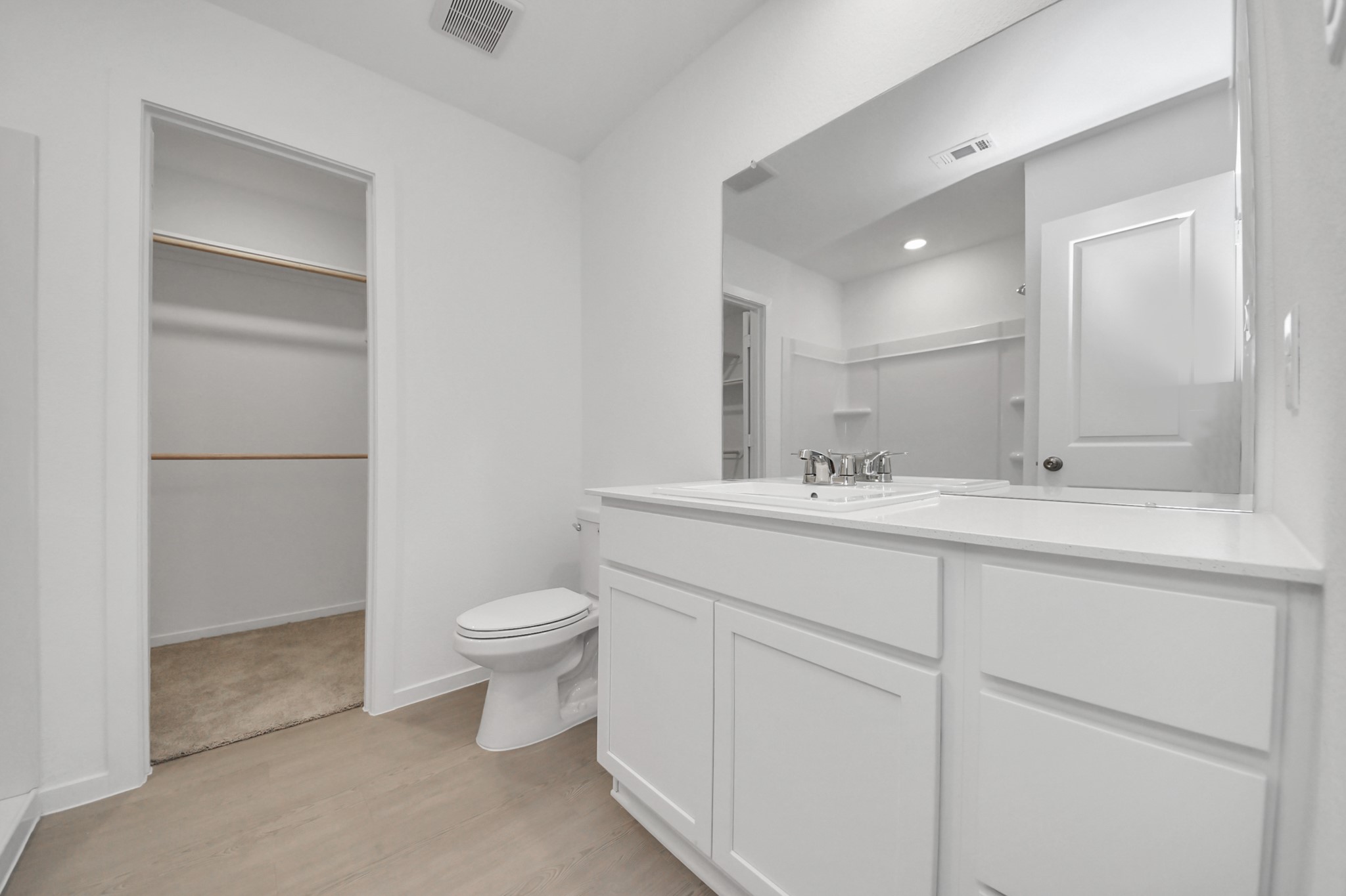 2931 Summer Breeze Way Angleton, TX 77515 - Photo 20 of 30 a bathroom with a sink a toilet and shower