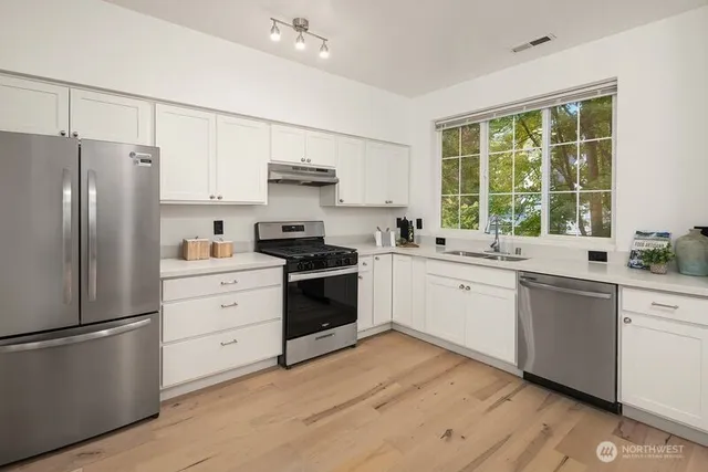 $675,000 | 18247 Northeast 96th Way, Unit 104, Redmond, WA 98052