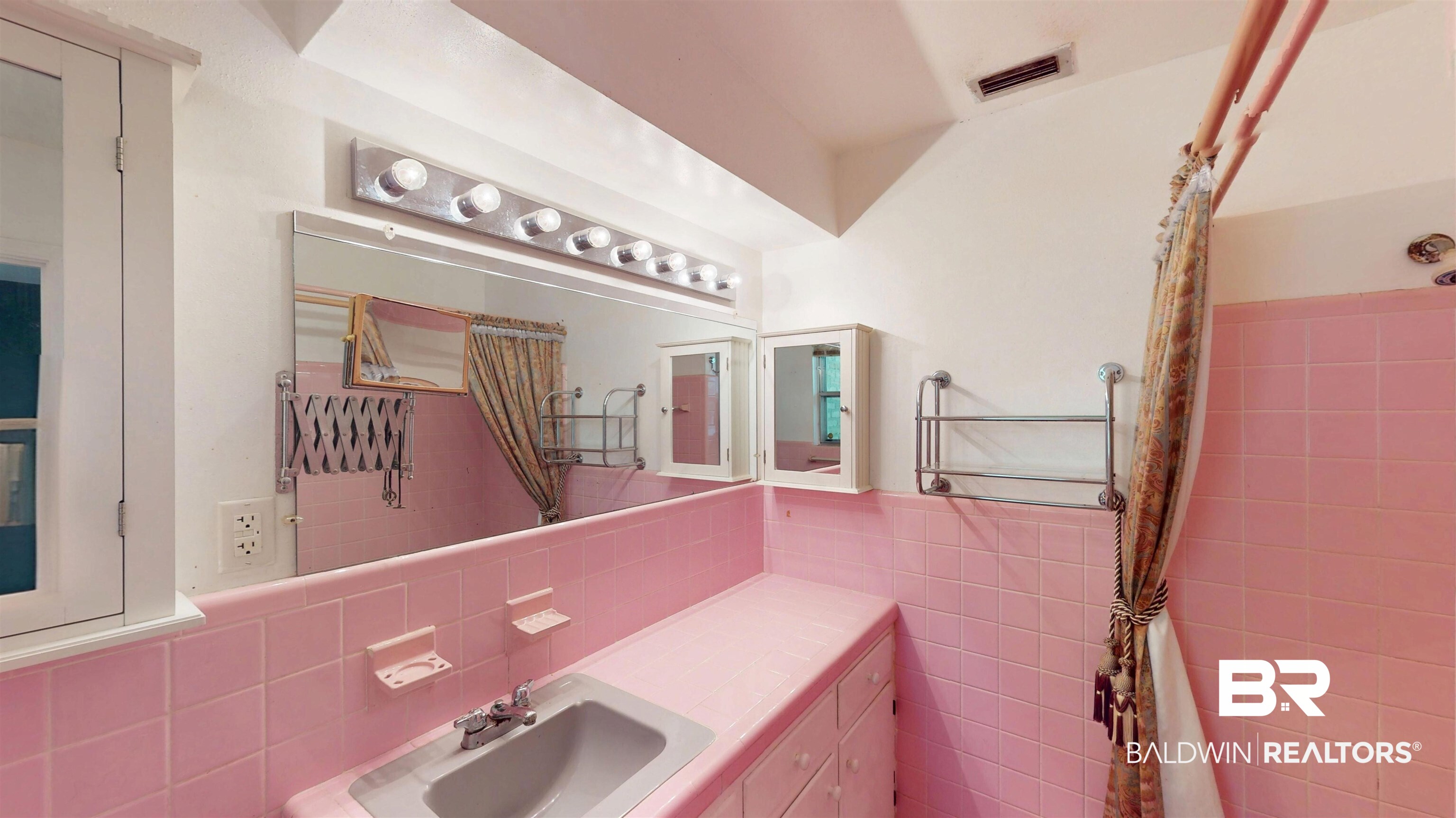 1075 Zurich Street Mobile, AL 36608 - Photo 26 of 35 Bathroom with a shower with curtain, vanity, and tile walls