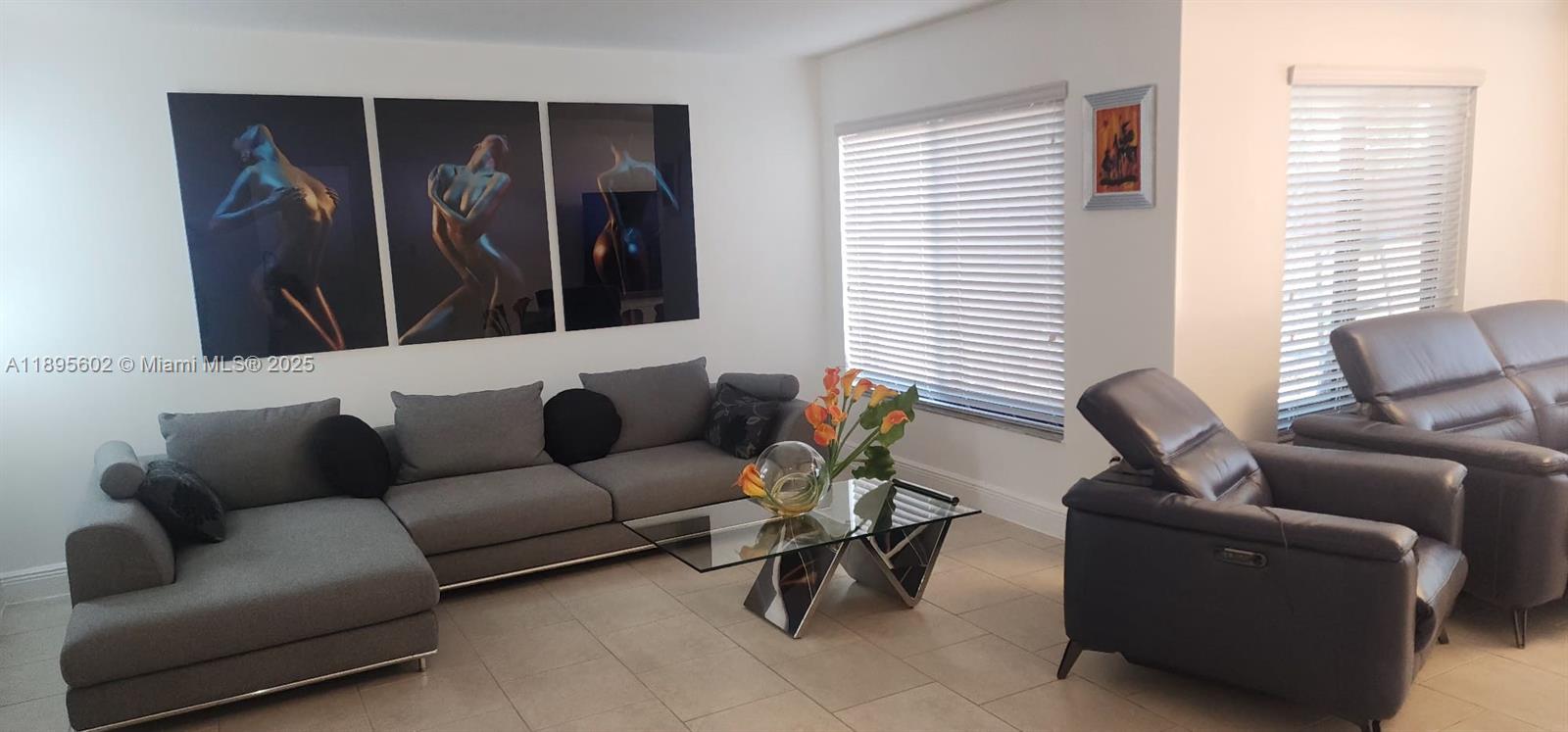 13208 Southwest 10th Lane Miami, FL 33184 - Photo 2 of 10 a living room with furniture and a window