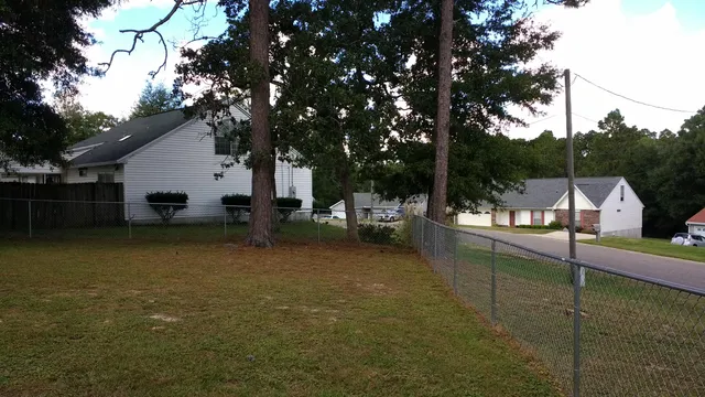 a view of a house with a garden