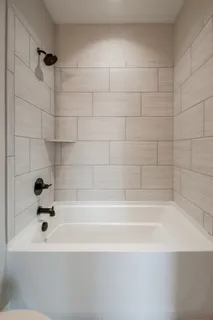 a bathroom with a bathtub