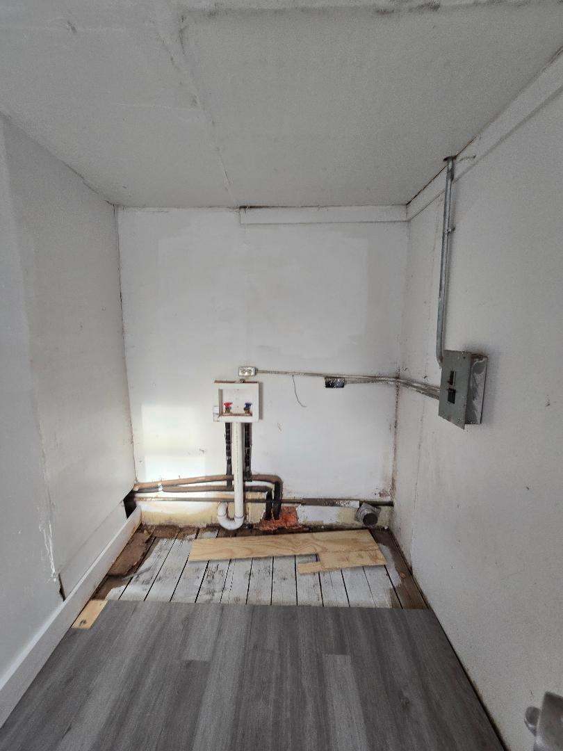 702 North Ave O Lamesa, TX 79331 - Photo 9 of 12 a view of a room with wooden floor