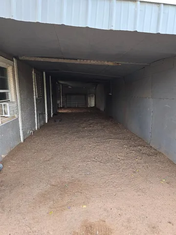 an empty room with a fireplace