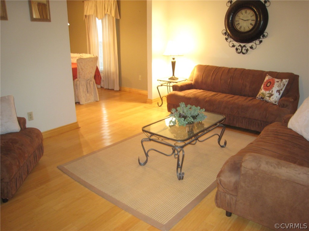 4512 Rabbit Foot Lane North Chesterfield, VA 23236 - Photo 11 of 46 Solid bamboo flooring in living room and dining ro