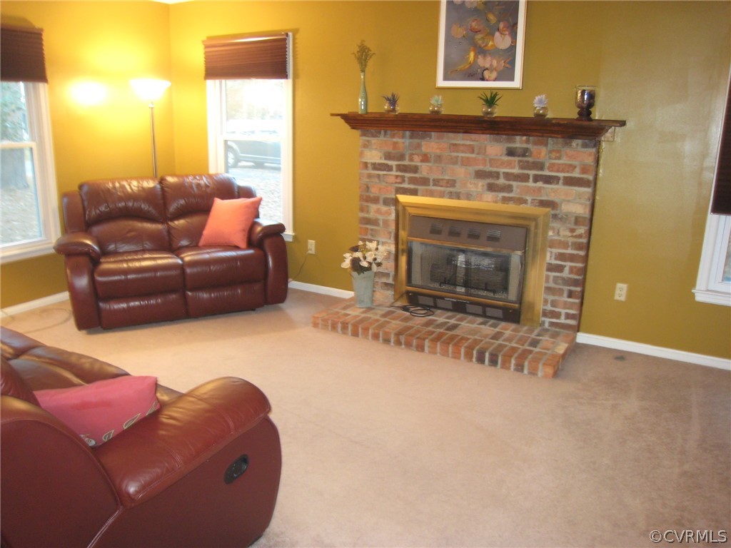 4512 Rabbit Foot Lane North Chesterfield, VA 23236 - Photo 24 of 46 Cozy family room with four replaced double hung ea