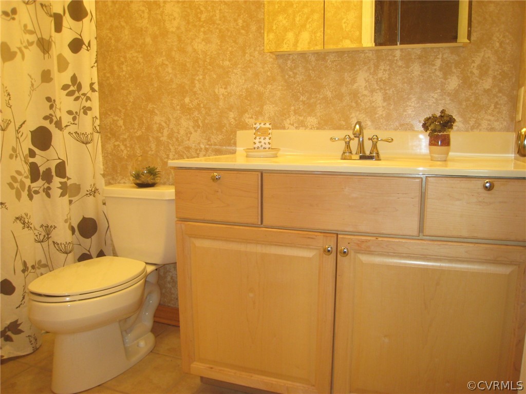 4512 Rabbit Foot Lane North Chesterfield, VA 23236 - Photo 46 of 46 Elongated toilet, tile floor, tile tub surround, r