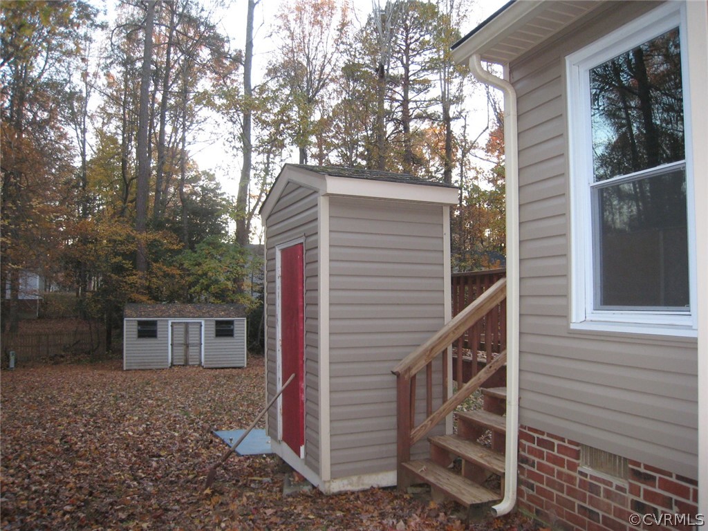 4512 Rabbit Foot Lane North Chesterfield, VA 23236 - Photo 7 of 46 Garden shed, just leveled, same siding as house, n