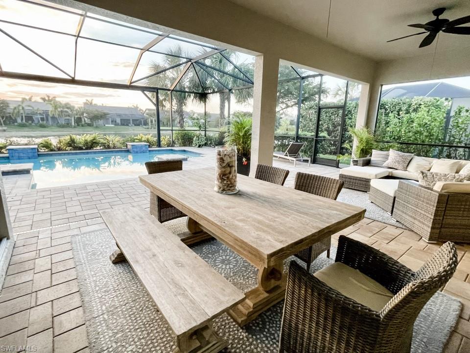16163 Cartwright Lane Naples, FL 34110 - Photo 24 of 35 a view of an outdoor space with seating