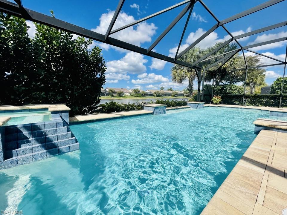 16163 Cartwright Lane Naples, FL 34110 - Photo 27 of 35 a view of yard with patio