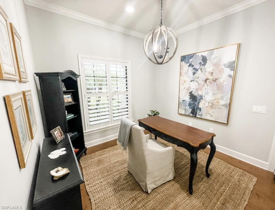 16163 Cartwright Lane Naples, FL 34110 - Photo 6 of 35 a view of workspace with wooden floor windows