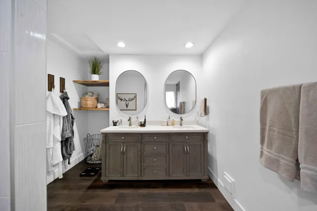 a view of cabinets with wooden floor and windows