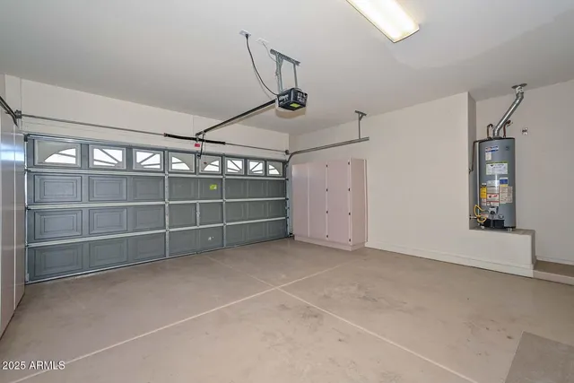 a view of an empty room with closet