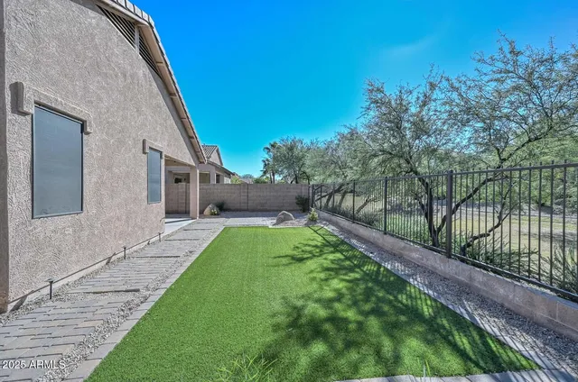 a house view with a backyard space