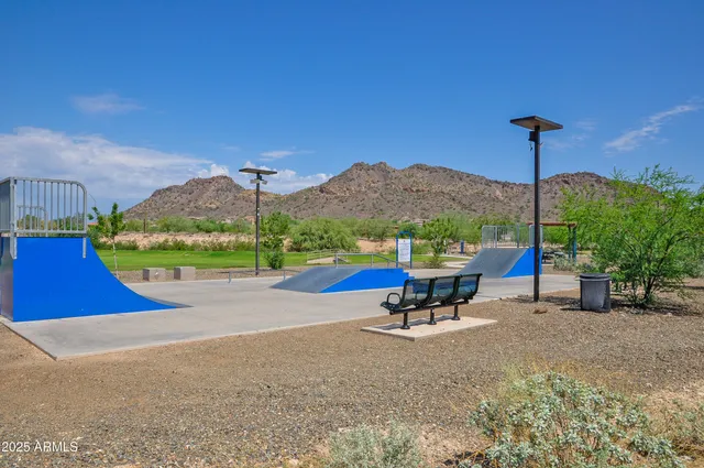 a bench sitting in the middle of a park