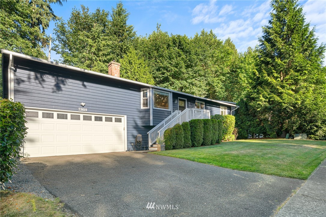 23019 19th Drive Southeast Bothell, WA 98021 - Photo 2 of 28 a view of a house with a yard