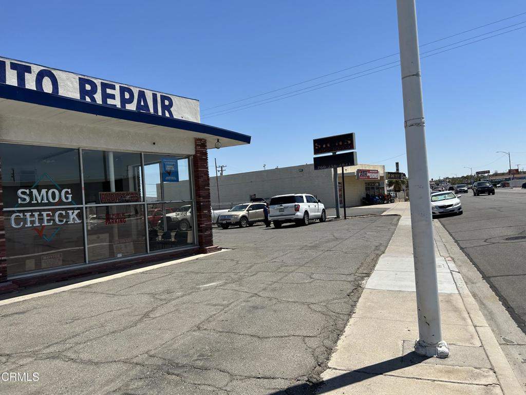1401 Main Street Barstow, CA 92311 - Photo 14 of 66 a view of a building with car parked