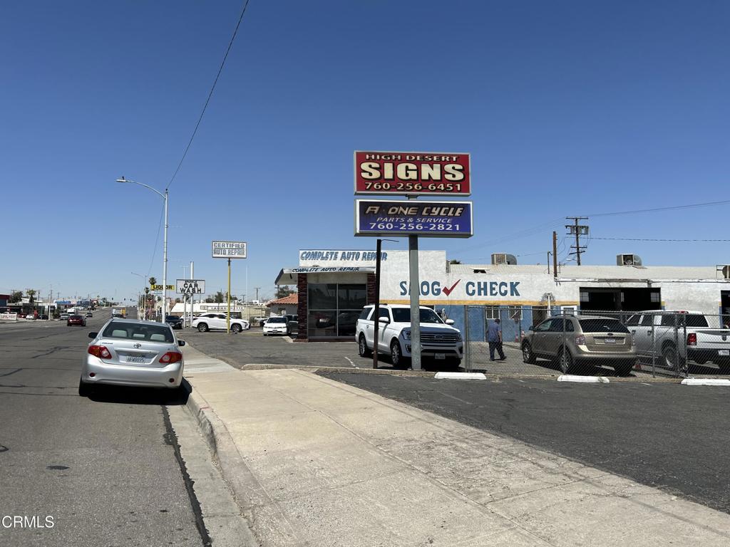 1401 Main Street Barstow, CA 92311 - Photo 15 of 66 a view of cars parked in a parking lot