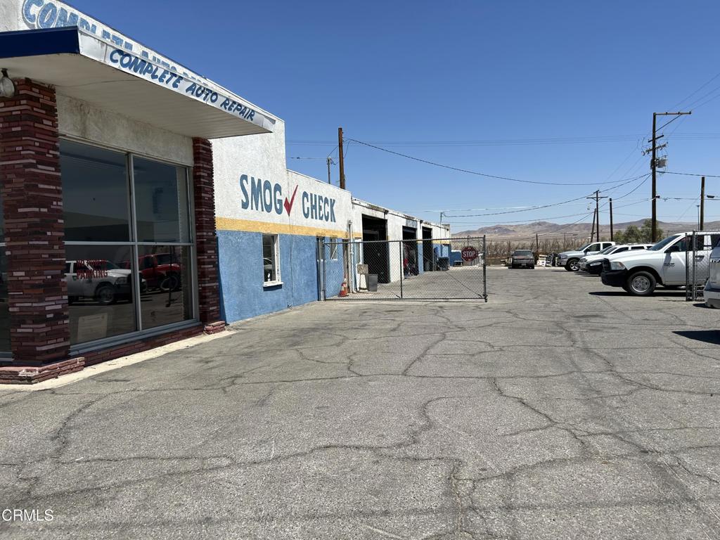 1401 Main Street Barstow, CA 92311 - Photo 20 of 66 a group of cars parked in front of building