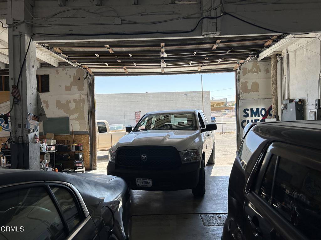 1401 Main Street Barstow, CA 92311 - Photo 33 of 66 a car parked in a garage