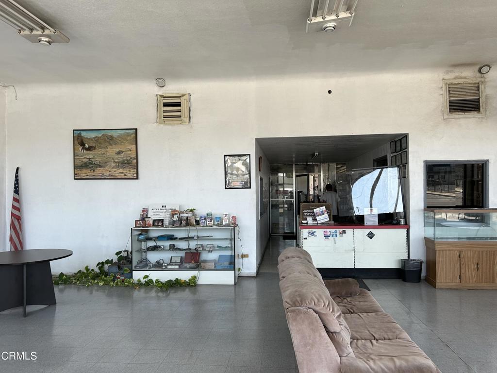 1401 Main Street Barstow, CA 92311 - Photo 48 of 66 a living room with furniture and flat screen tv