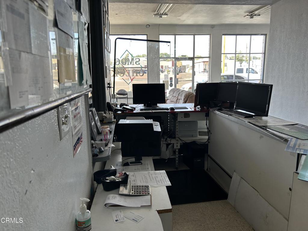 1401 Main Street Barstow, CA 92311 - Photo 50 of 66 a view of a workspace with furniture and a window