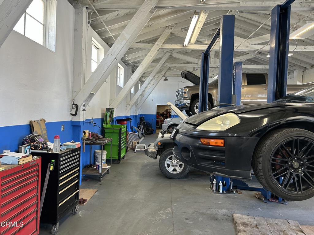 1401 Main Street Barstow, CA 92311 - Photo 60 of 66 a car is parked in a garage