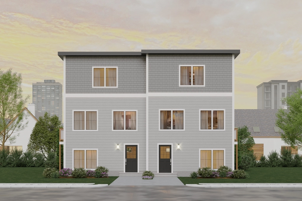 1173 South Main Street Fall River, MA 02724 - Photo 3 of 8 a front view of a building with a yard