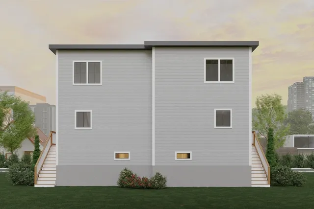 a view of house with yard