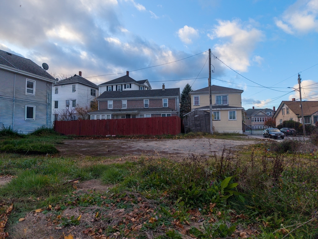 1173 South Main Street Fall River, MA 02724 - Photo 7 of 8 a view of a house with a back yard