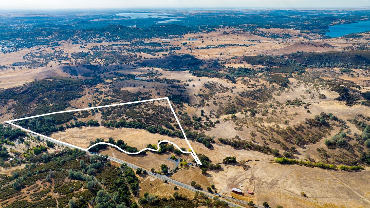 0 Highway 12 Valley Springs, CA 95252 - Photo 48 of 48 an aerial view of residential houses with outdoor space