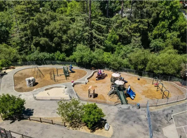 an aerial view of a swimming pool and outdoor space