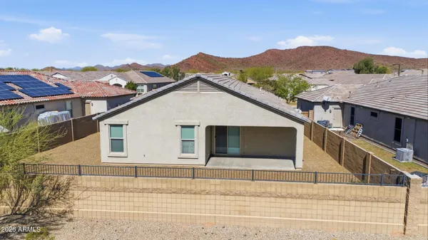 a view of a house with a mountain