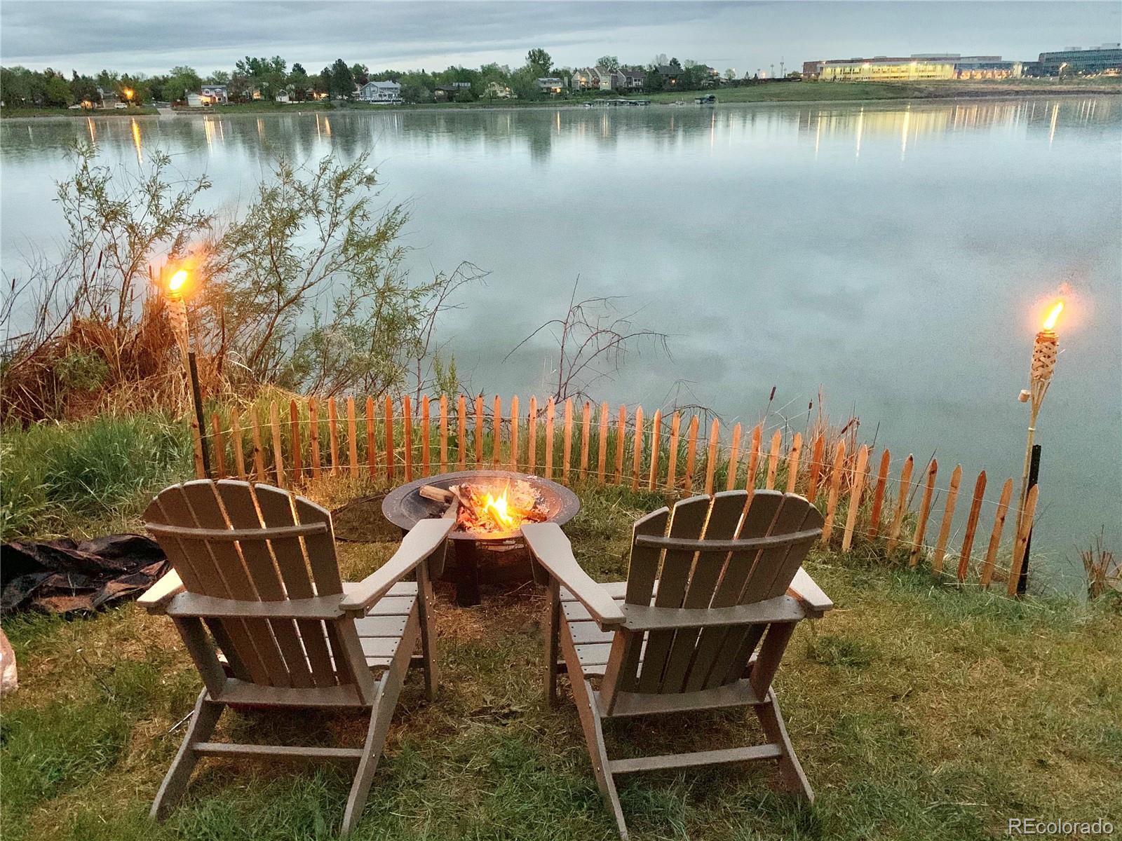 6830 Xavier Circle, Unit 3 Arvada, CO 80030 - Photo 1 of 28 swimming pool view with a lake view
