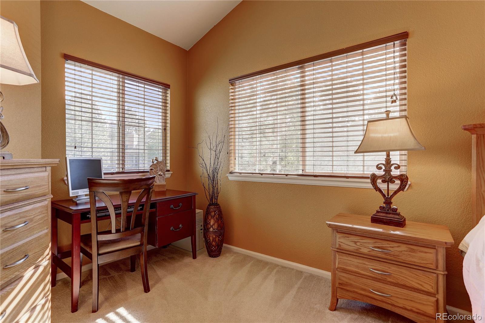 6830 Xavier Circle, Unit 3 Arvada, CO 80030 - Photo 15 of 28 a view of a workspace with furniture and a window