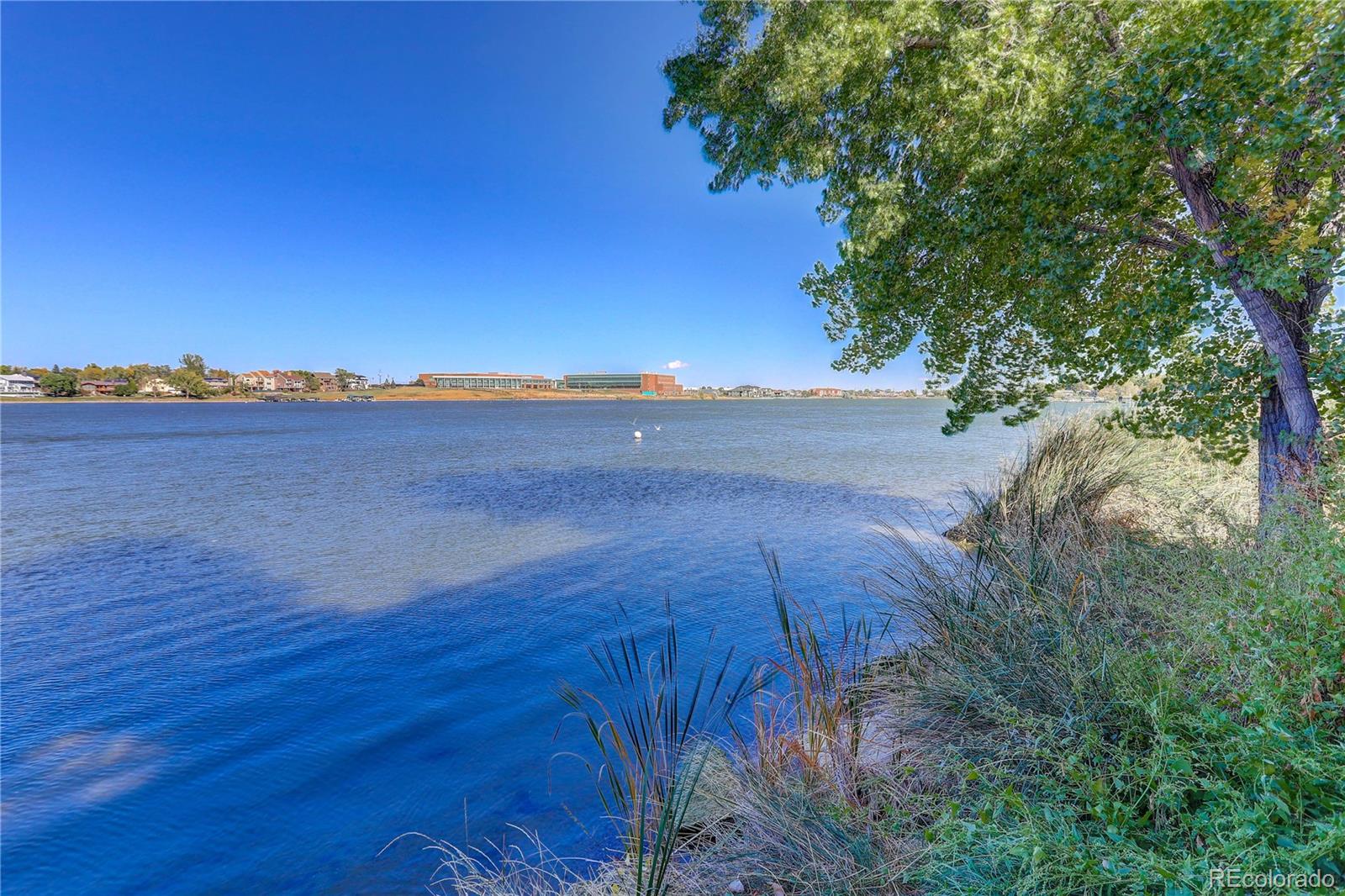 6830 Xavier Circle, Unit 3 Arvada, CO 80030 - Photo 24 of 28 a view of an ocean and a yard