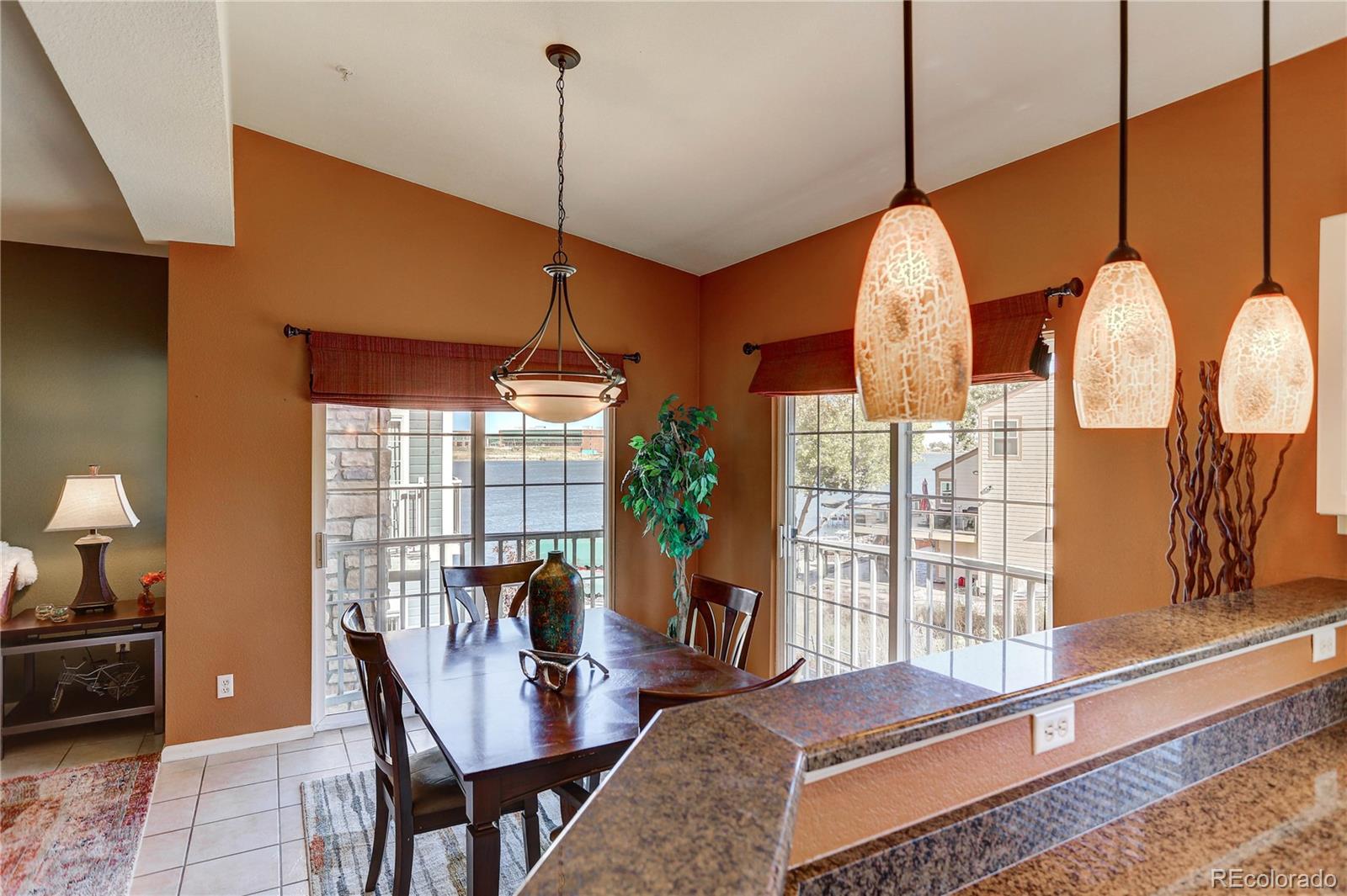 6830 Xavier Circle, Unit 3 Arvada, CO 80030 - Photo 10 of 28 a view of a livingroom with furniture and window