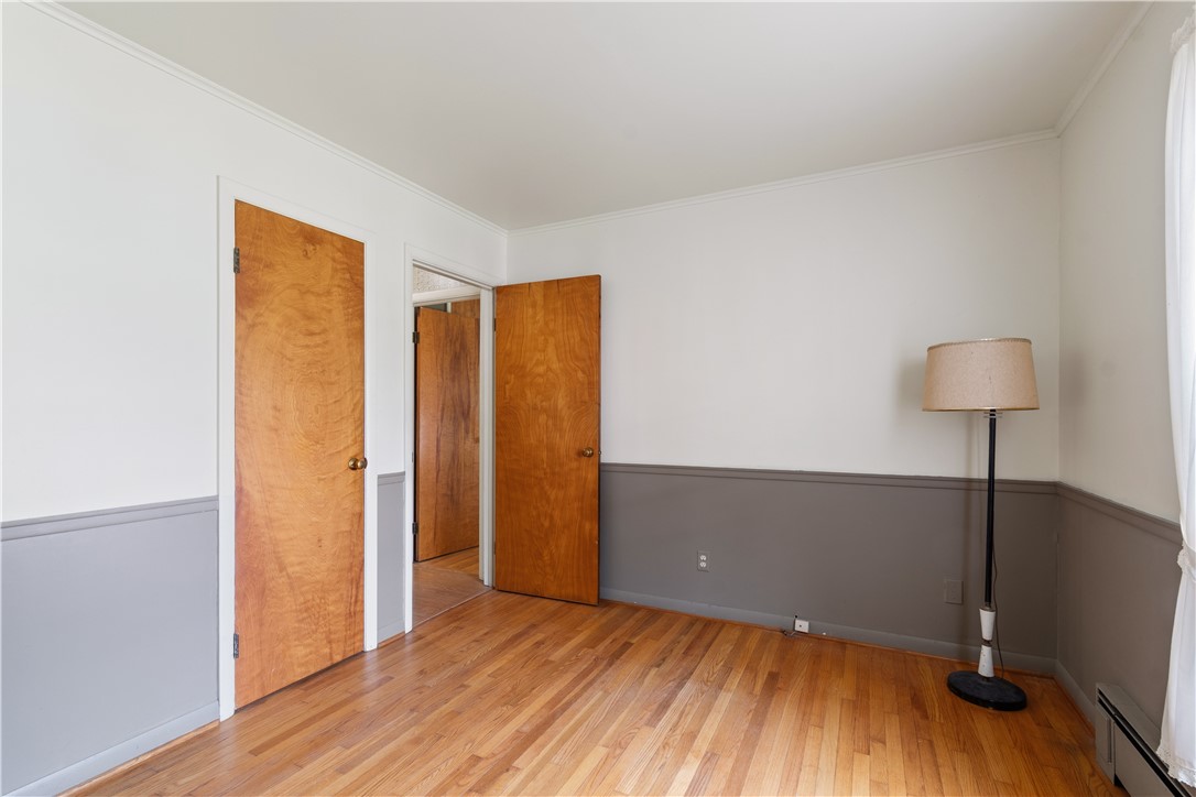 6592 Tuckahoe Road Williamson, NY 14589 - Photo 22 of 40 One of the bedrooms on the first floor - there is a FULL BATH too!