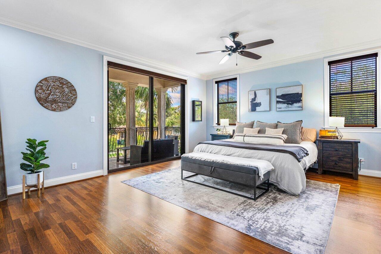 507 Southwest 17th Street Fort Lauderdale, FL 33315 - Photo 13 of 25 a spacious bedroom with a large bed and a large window