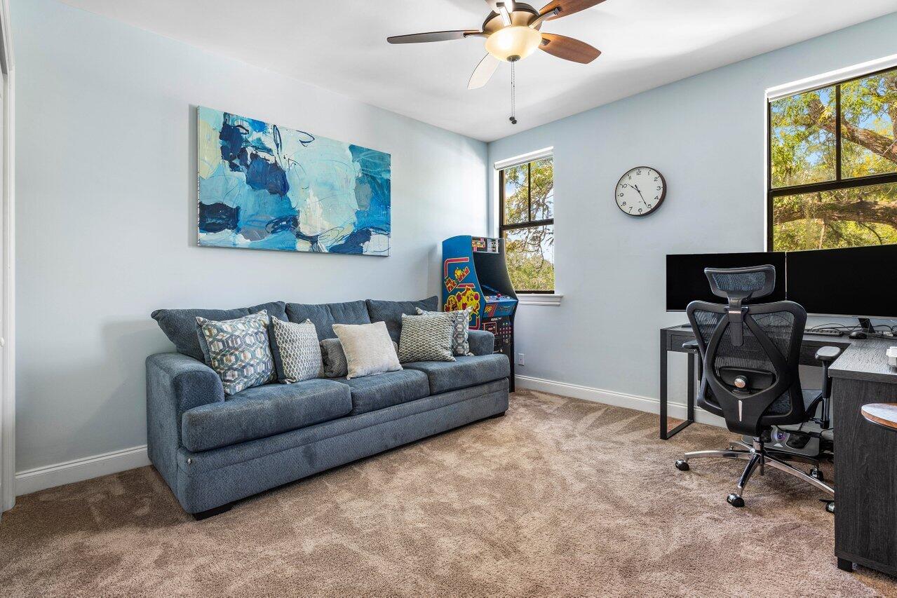 507 Southwest 17th Street Fort Lauderdale, FL 33315 - Photo 21 of 25 a living room with furniture a clock and a window