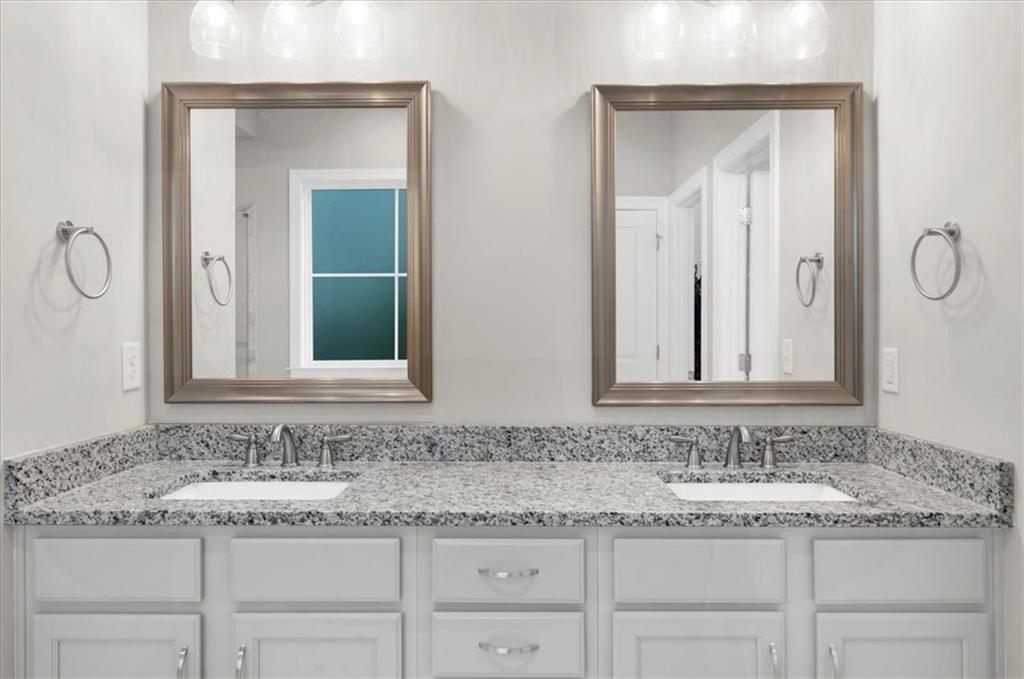 320 Senna Street Marietta, GA 30064 - Photo 41 of 53 a bathroom with a granite countertop sink and a mirror